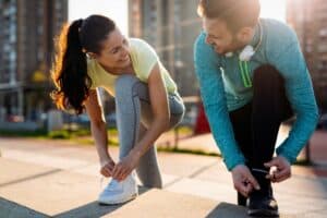 Couple exercising to prevent gum disease in Bonita Springs