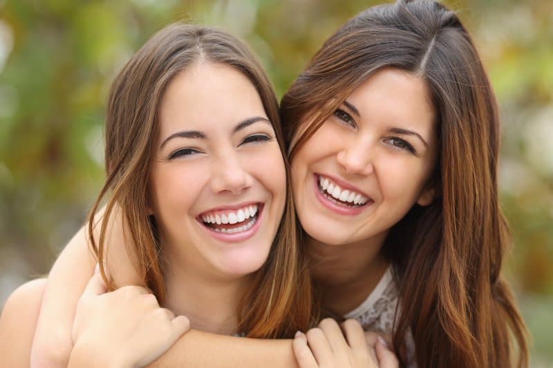 two females smiling